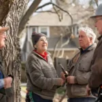 Seniors discussing tree trimming